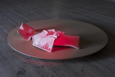 Rehearsal, 2016. Prop flowers from The Royal Theatre, plaster, spotlight, revolving stage in MDF. Photo: David Stjernholm.  
