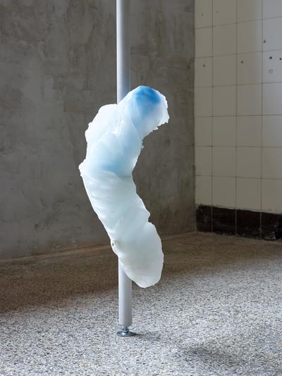 Spillover, 2020. 
Paraffin wax, pigment, silicone, sandblasted aluminum, steel. H: Flexible. 
