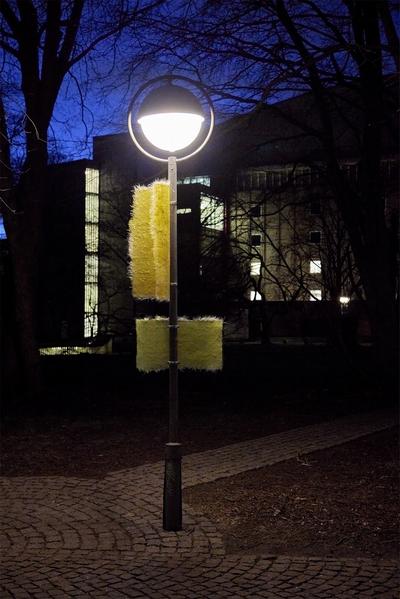 Sleepwalk, 2022. Resin, pigment, fiberglass, lamppost.
