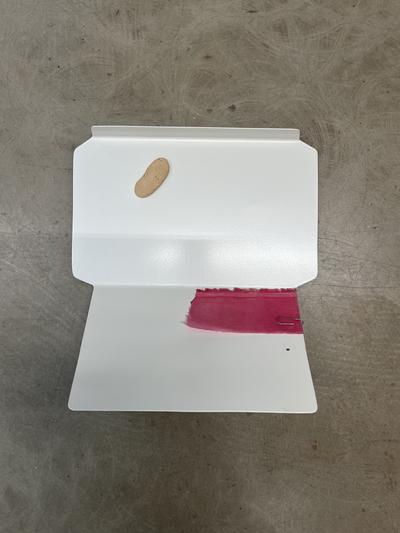 1:25, 2025. Pulverlakeret stål, fundet teglsten, magnet, klips, vokset hør, pigment. 
