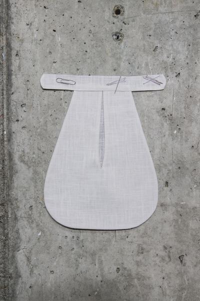 A mother, 2026. Linen, paper clips, sewing needles. 
