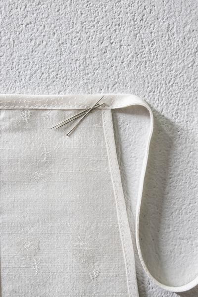 Moment of panic, 2026. Silk, sewing needles. 
