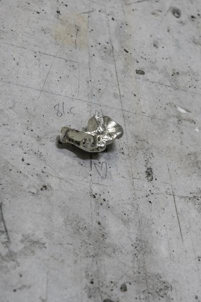 Monuments, 2026. Tin cast of chewing gum.
