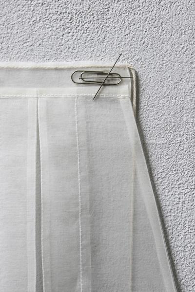 Index, 2026. Silk organza, paper clips. 
